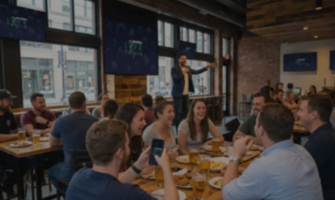 A host running a Buzztime Live Trivia round while players answer from their phones.